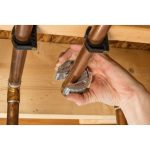 57008_RIDGID_C WaterHeater Cutter OnCopperCloseUp_72dpi